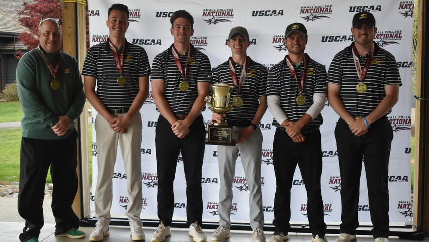 golf team with trophy