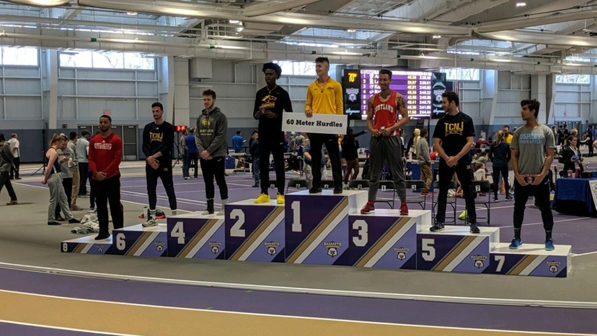 Humphrey Banful standing second on the podium after finishing runner-up in the 60-meter hurdles. 