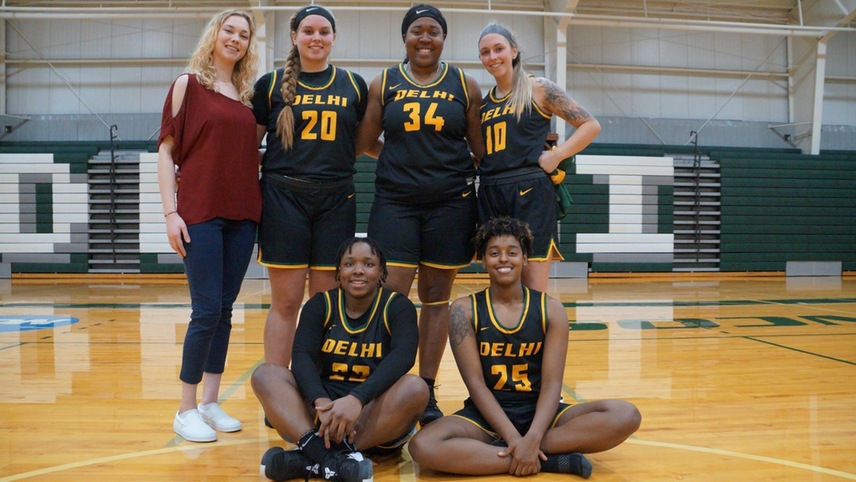 The six graduating members of the SUNY Delhi women's basketball team pose for a group photo.