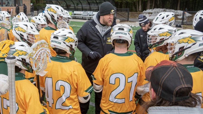 Sam Miller lecturing his team prior to a game.