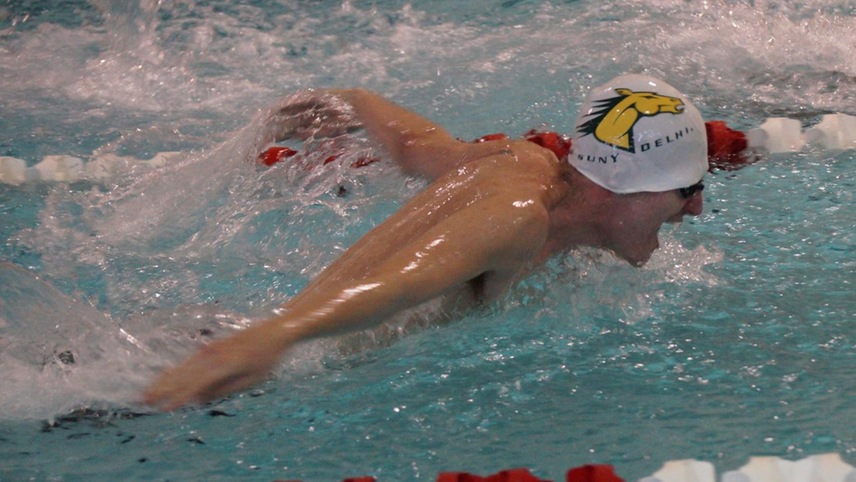 Taylor Filipowski in a butterfly swim race.