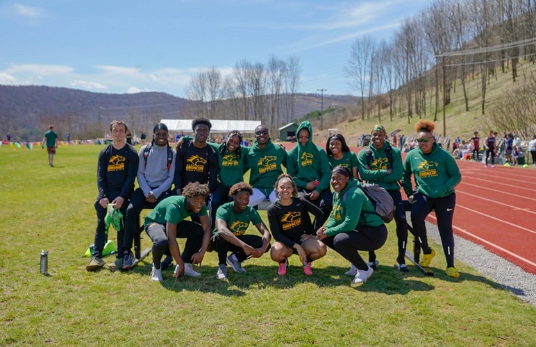 Members of the SUNY Delhi track and field team posing during competition at the Bronco Classic. 