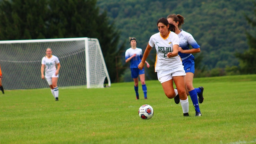 Alexa Scaglione moving the ball up the field