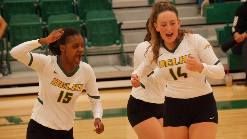 Witchney Clersainville and Taylor Tsatsis celebrating after a point.